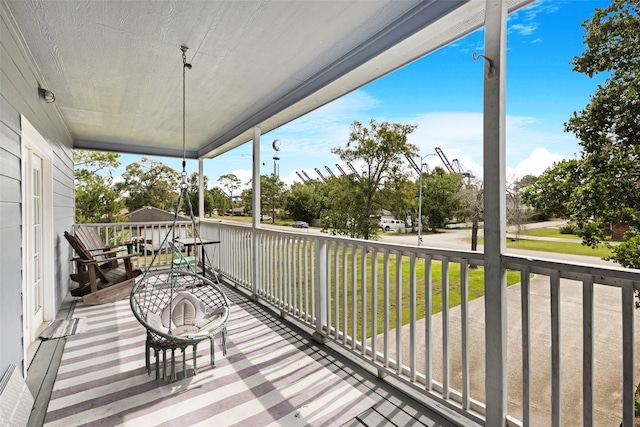 balcony featuring a porch