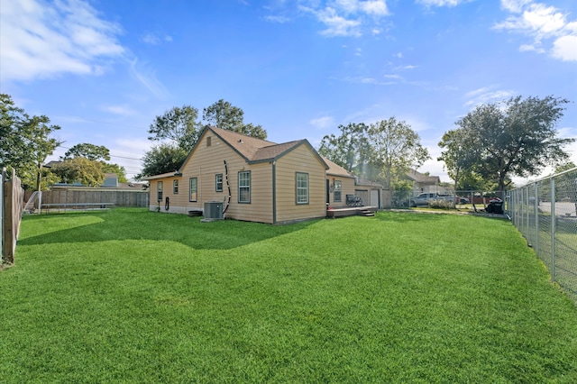 view of yard featuring central AC