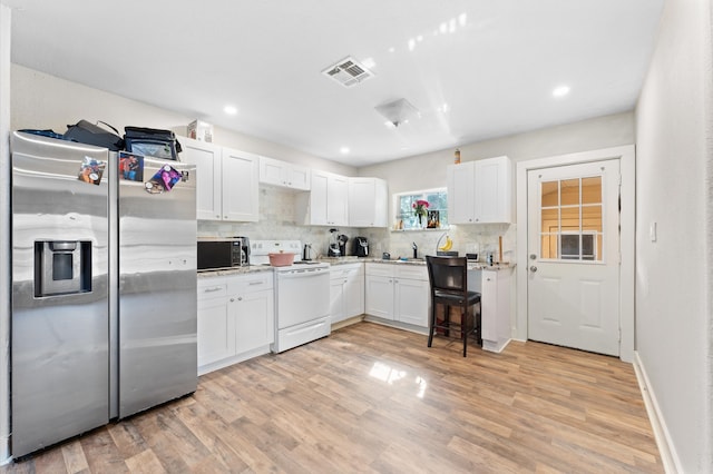 kitchen featuring light wood-type flooring, white cabinetry, white electric range oven, and stainless steel fridge with ice dispenser