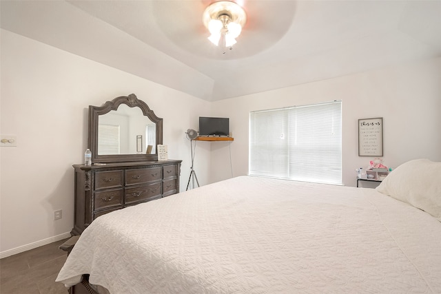 bedroom featuring ceiling fan and tile patterned floors