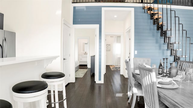 dining space featuring dark hardwood / wood-style flooring