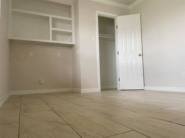 unfurnished bedroom featuring a closet and crown molding