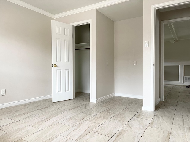 unfurnished bedroom featuring a closet and ornamental molding