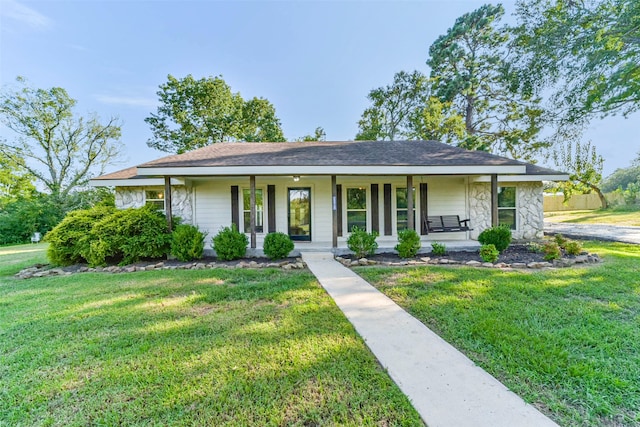 single story home with a front yard and a porch