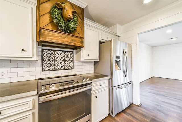 kitchen featuring ornamental molding, white cabinetry, stainless steel appliances, dark hardwood / wood-style floors, and decorative backsplash