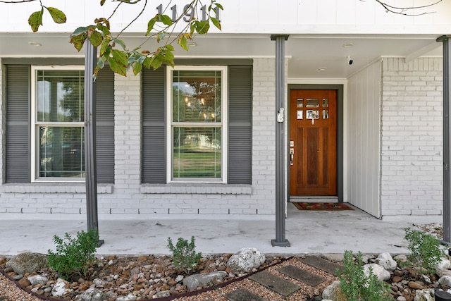 entrance to property with covered porch