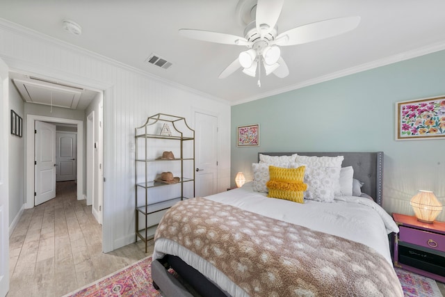 bedroom with ornamental molding, light hardwood / wood-style floors, and ceiling fan