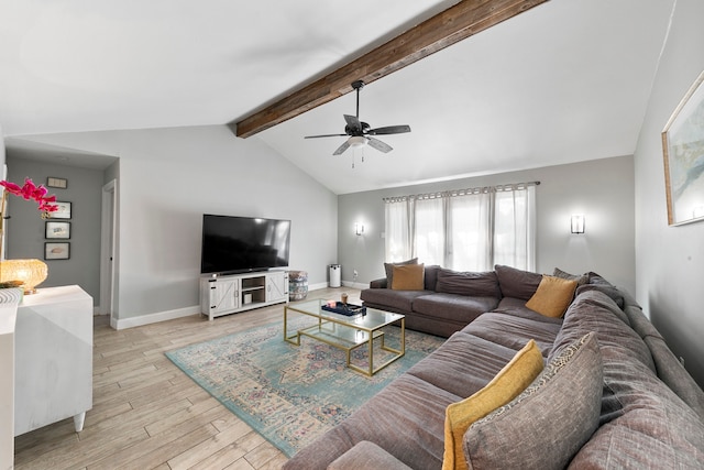 living room featuring ceiling fan, lofted ceiling with beams, and light hardwood / wood-style flooring