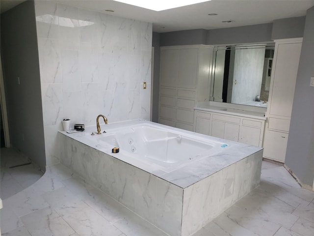 10738 Villa Lea Ln, Houston, TX 77071 - full bathroom with marble finish floor, a jetted tub, and vanity
