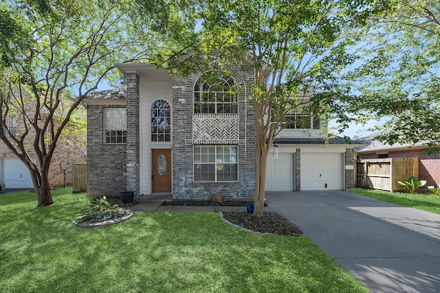 view of front facade with a front lawn and a garage