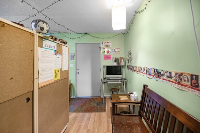 corridor featuring hardwood / wood-style flooring