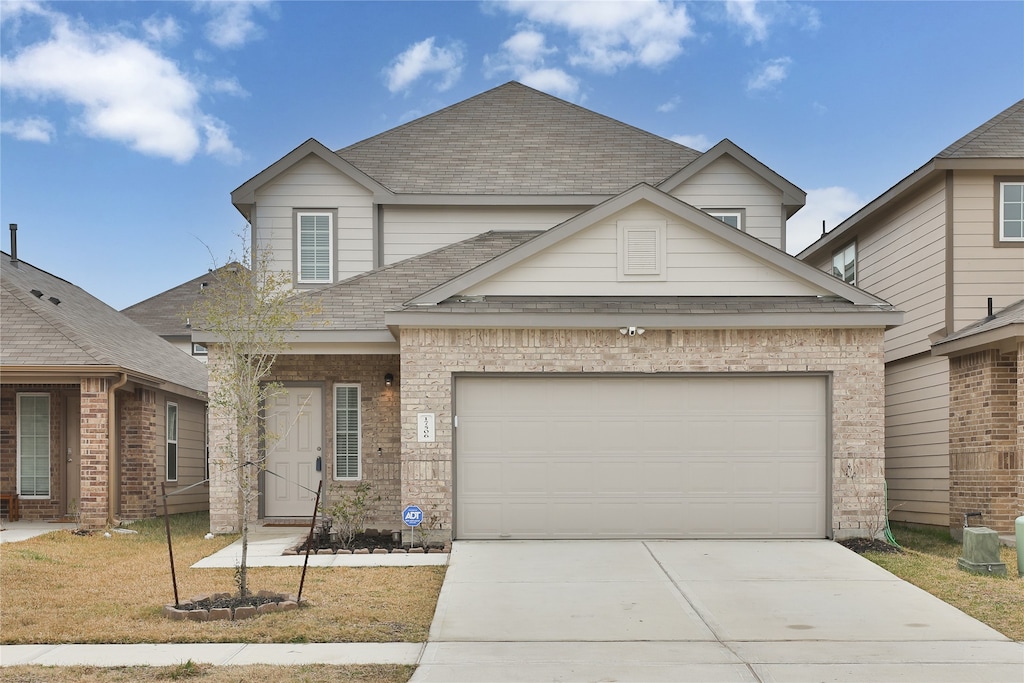 view of front of home featuring a garage