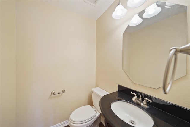 bathroom with sink and toilet