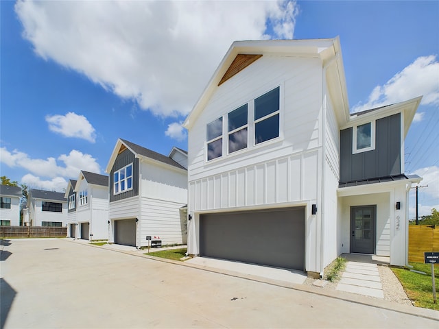 view of front of property featuring a garage