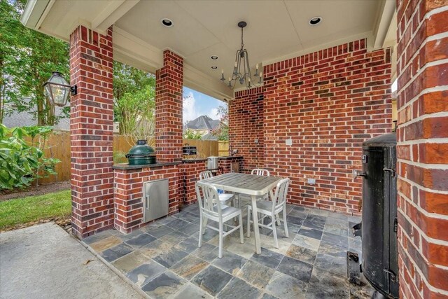 15026 Blossom Bay Dr, Houston, TX 77059 - view of patio featuring outdoor dining area, fence, and area for grilling