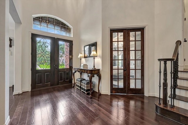 15026 Blossom Bay Dr, Houston, TX 77059 - foyer entrance with baseboards, wood finished floors, and french doors