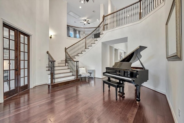 15026 Blossom Bay Dr, Houston, TX 77059 - entryway featuring stairs, french doors, baseboards, a ceiling fan, and wood finished floors