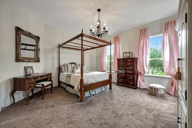15026 Blossom Bay Dr, Houston, TX 77059 - carpeted bedroom with baseboards and an inviting chandelier