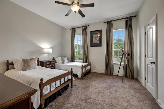 15026 Blossom Bay Dr, Houston, TX 77059 - carpeted bedroom featuring baseboards and a ceiling fan