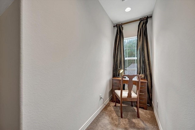 15026 Blossom Bay Dr, Houston, TX 77059 - living area featuring baseboards, a textured wall, and carpet flooring