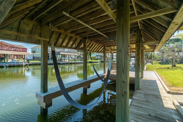 dock area featuring a water view