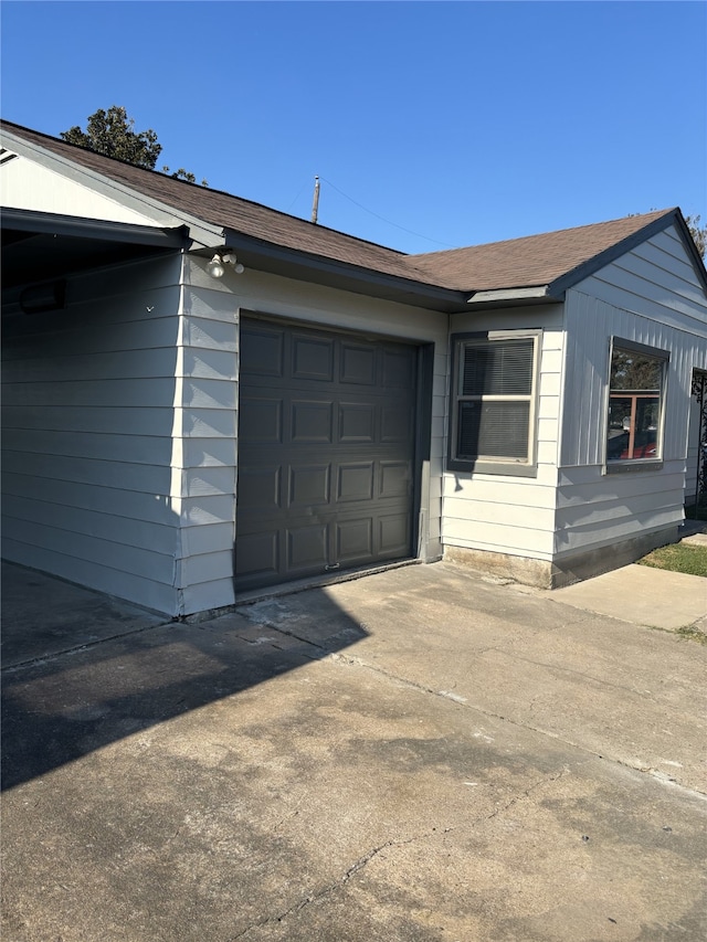 exterior space featuring a garage