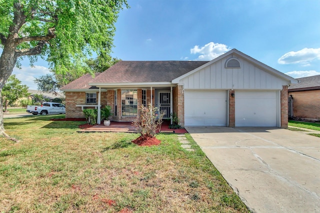 single story home featuring covered porch, a front yard, and a garage