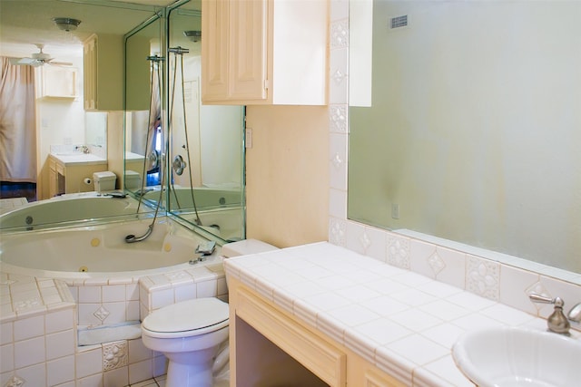 8235 Sands Point Dr Unit 156, Houston, TX 77036 - bathroom with a jetted tub, vanity, a ceiling fan, and a shower