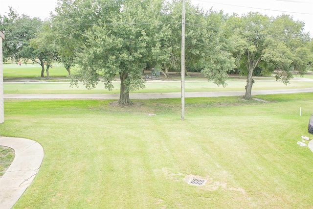 8235 Sands Point Dr Unit 156, Houston, TX 77036 - surrounding community featuring a lawn
