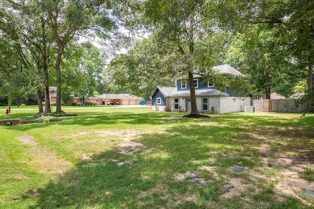 view of yard featuring central AC