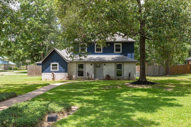 view of front of home with a front yard