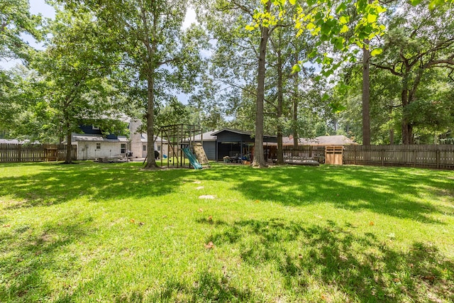 view of yard with a playground