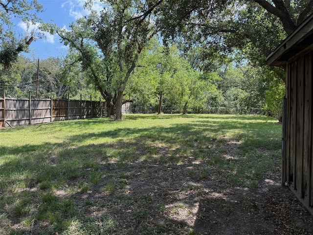view of yard with a fenced backyard