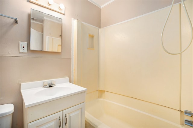 full bathroom with bathtub / shower combination, ornamental molding, vanity, and toilet