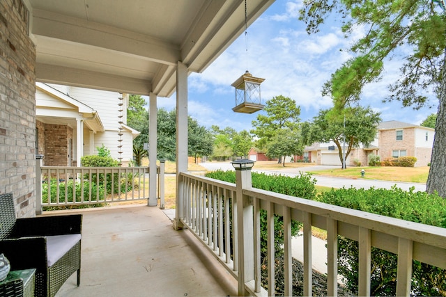 balcony featuring a porch