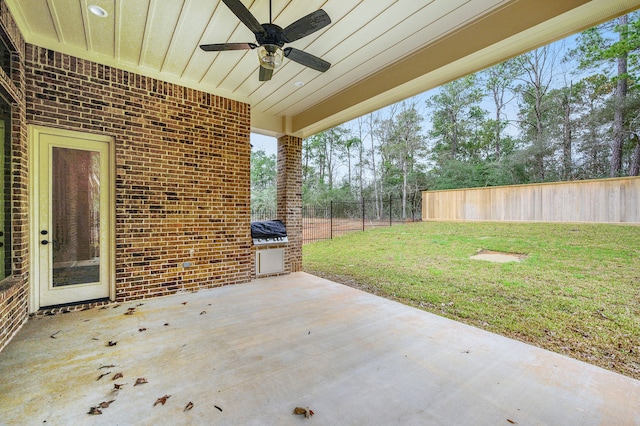 view of patio featuring ceiling fan