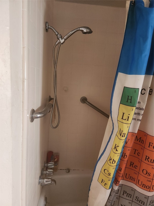 bathroom featuring shower / bath combination with curtain