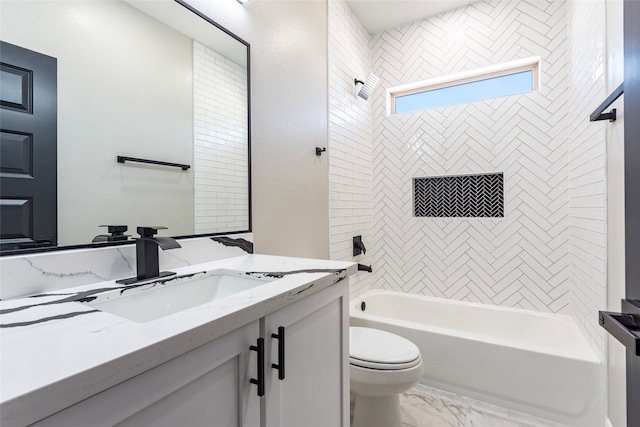 full bathroom with tiled shower / bath combo, vanity, and toilet