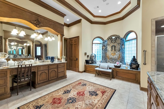 bathroom featuring ornamental molding, a high ceiling, vanity, and plus walk in shower