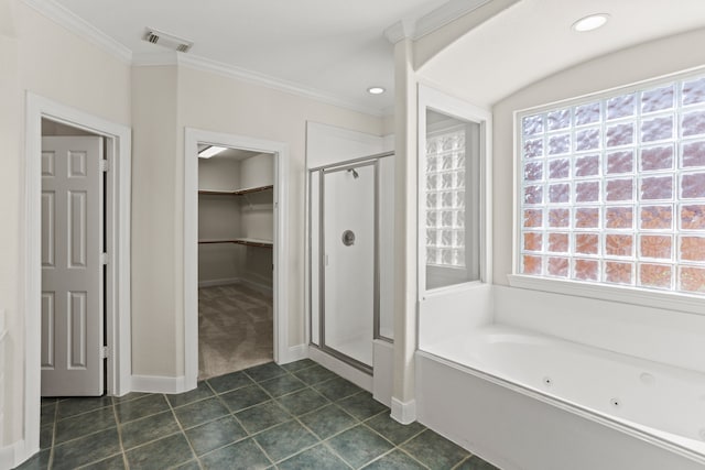 bathroom with ornamental molding, tile patterned flooring, and separate shower and tub