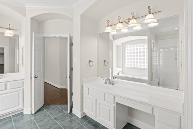 bathroom with independent shower and bath, vanity, tile patterned flooring, and ornamental molding