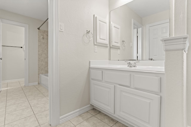 bathroom with tile patterned flooring, vanity, and shower / bathing tub combination