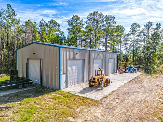 view of outbuilding featuring a garage