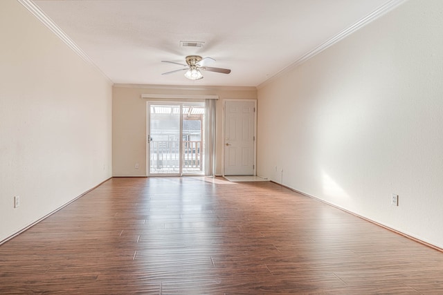 empty room featuring ornamental molding, ceiling fan, and hardwood / wood-style floors