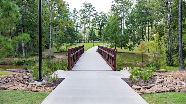 surrounding community with a water view