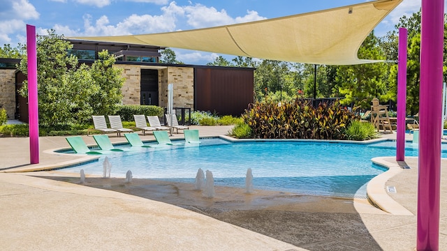 view of pool featuring a patio