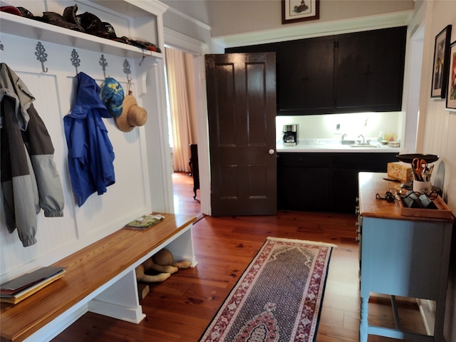 mudroom featuring sink and dark hardwood / wood-style flooring