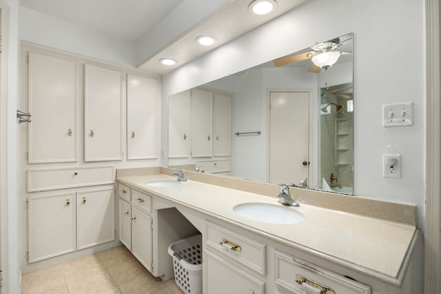 bathroom featuring a shower, vanity, ceiling fan, and tile patterned floors