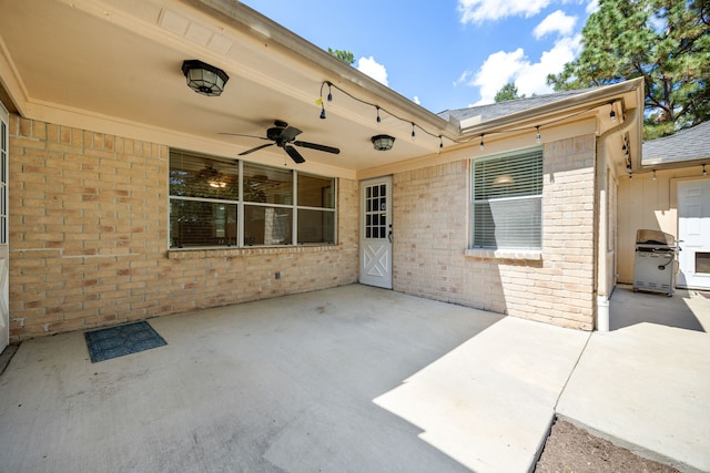 view of patio / terrace with ceiling fan and grilling area