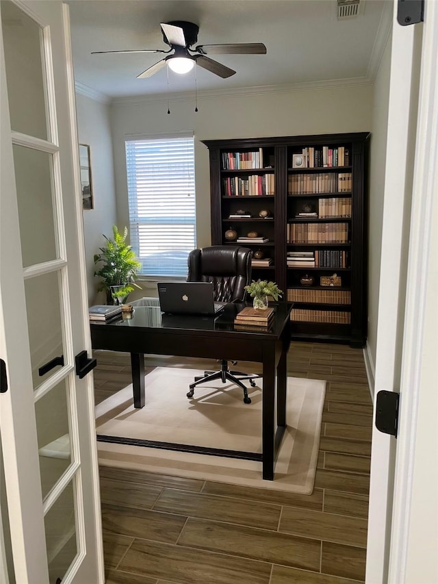 office space featuring crown molding, french doors, ceiling fan, and hardwood / wood-style flooring